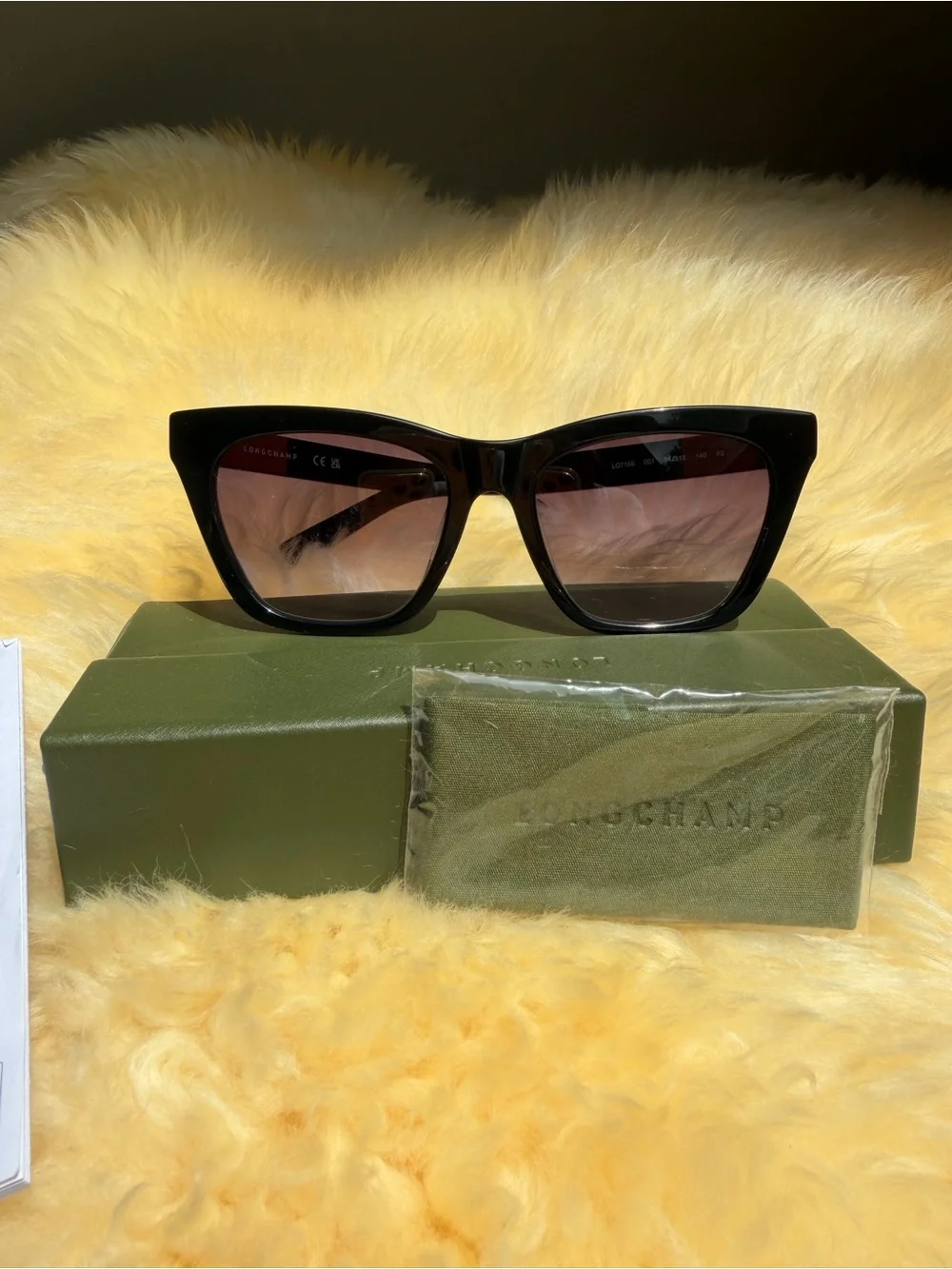 Longchamp Black Cat-Eye Sunglasses with Brown Gradient Lenses